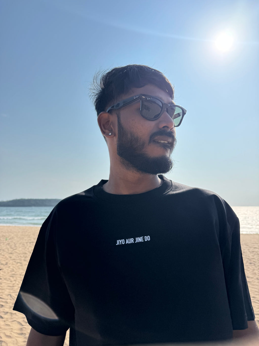 OSHO Jiyo Aur Jine Do oversized heavyweight t-shirt front view of person wearing it